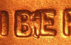 2017 Lincoln penny BIE die break error showing raised metal blob between the B and E in LIBERTY caused by a crack in the die